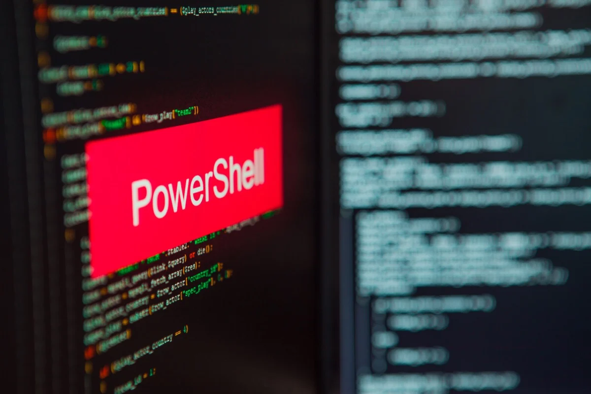 Programming language, PowerShell inscription on the background of computer code. - The Back Room Tech