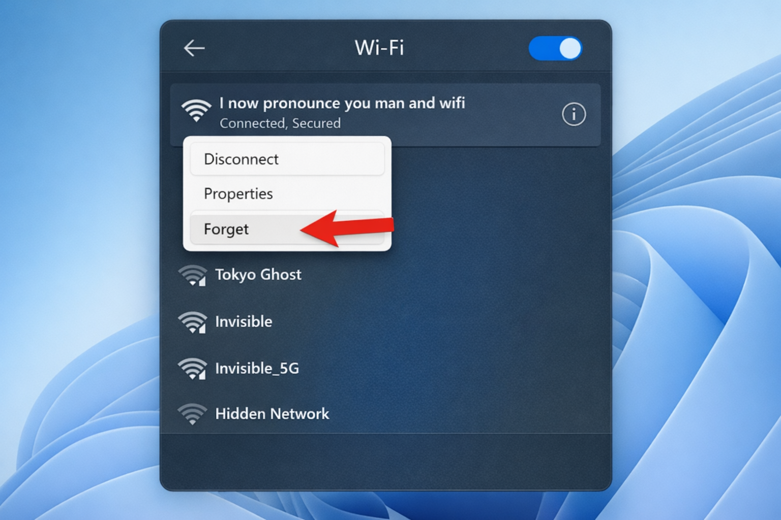 Flyout Wi-Fi de la barre des tâches Windows 11 montrant un réseau avec le bouton Oublier visible